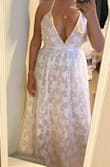 True to size and beautiful! However, I feel that it makes you look a little wider than normal! I would recommend this dress to someone skinny. - Estefany R.