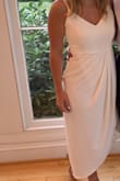 I wore this dress to my wedding rehearsal- it was very flattering to my body shape, and loved the length. The only complaint I have is that it's a little thin, where you can clearly see the other layer underneath. But overall got so many compliments on the dress and felt so comfortable in it!! - Emily W.