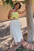 Was in Arizona on vacay. Kept me cool. Light fabric, wear it with any crop top. - Trineice C.