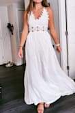 I love this dress, and I'm so excited to wear it on our beach trip next week! It doesn't have much stretch around the ribcage. I'm wearing an xs, but a small may be a little more comfortable. - Ashley M.