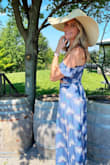 I bought this dress online and I wasn't too sure about it but I'm so happy I did! Wore it to a winery and paired it with a floppy hat. Fit well and it was long enough (amen). I received so many compliments! - Sara B.