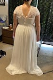 I bought this dress for my daughters ceremony. I was skeptical at first but was amazed at the quality of the fabric. It was definitely a little long which was stated in other reviews. But after a few alterations, it was perfect. Absolutely worth the money. Would definitely recommend and buy from here again! - Carmen H.