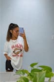 I love everything about this stylish graphic tee! It can be dressed up or down, perfectly.
The fit is relaxed and super soft! - Jenevah A.