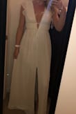 This dress exceeded my expectations. It's so classy with a hint of sexy. The lining of the dress on the shoulders has a plastic strip that helps it not slip. Shipping was so fast & even came with a garment bag! I can't wait to wear this for my engagement pictures and bridal shower. - Chloe E.