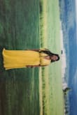 The color is beautiful. I am usually a size L but I sized up to XL. The dress fit perfectly and was comfortable. I love the wrap style and the maxi dress. - Claire B.