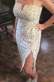 This dress is perfect! I sized up to M to make sure it wasn't skin tight, and I could have gotten away with a Small. But it still fits great. I waited weeks for my size to get in stock and when it did delivery was quick to! This dress will be perfect for any occasion! I'll be using it as my courthouse wedding dress. - Melissa H.