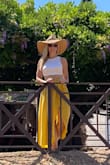 This skirt was perfect for my trip to Italy. It flowed and kept things breezy in the hot Italian weather. I walked the city all day in it and received so many compliments. I paired it with a cute Lulus crop top. - Briana B.