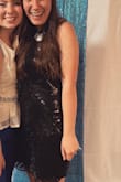 I loved wearing this for a recent bachelorette party! I ordered a size up to have it a bit looser and it looked amazing! I love the sequins and the high neck! I had to take in the bust a bit but the black on black made it so it didn't show :) - Ali M.