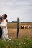 Heavy, comfy, soft. 
Wore it over my wedding dress in the evening. Did the trick. - Julie A.