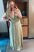 I really like this dress, it isn't see thru and the material is nice. I will say& the slit in the dress is deceiving. My leg literally never showed, which kind of causes the dress to make you appear larger than you are in my opinion. Aside from that I was a big fan! Also, a button or something in the cleavage would be nice, I used a safety pin to keep it together. - Katherine S.