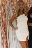 Purchased this dress for my bachelorette weekend. I was a little nervous based on the reviews it would be too short. Once I tried it on, it was perfect! It's shorter than your average dress but not too scandalous. Does not ride up, hugged in all the right places! Definitely recommend! - Jessica W.