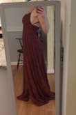 Gorgeous! Great material, love the color. It's very long so definitely need it hemmed, which I expected. True to size, little to no stretch so I recommend measuring yourself. - Alyssa W.