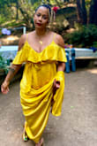 Pros: If you are hourglass/curvy this covers everywhere you want covered and accentuates everything you want accentuated! The material quality was surprisingly good! Got so many compliments it was crazy.
Cons: I ordered a large and I usually wear a medium, but the bust was still extremely tight. So if you are chesty just know that the small snap at your cleavage probably won't hold--you'll have to get it altered. It's also very long. Even with heels I had to pick up the hem. - Naomi R.