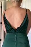 Beautiful dress. A little tight around the hips if you have curves. The back also will have to be ironed, but over all very soft and comfortable. - Mandy P.