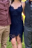 This dress was exactly like the pictures! True to size and comfortable! I loved the low back and how the straps were adjustable. I'm not very busty so I did have to use some fashion tape on the top to feel secure. But other than that, I got so many compliments and I felt gorgeous! - Chloe E.
