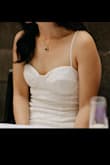 An affordable wedding dress that makes me feel beautiful- YES PLEASE. I bought two sizes and kept the smaller. It is tight o through the tummy so I wore shapewear underneath. The adjustable straps helped make sure the top fit correctly. The dress is stretchy to fit your curves and the little flounce on the bottom is so fun. I loved that the length means you don't have to hem :) - Minju C.