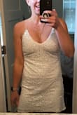 Got this dress after trying 4 other white sequin dresses and failing. This finally fit how I wanted it to! I have thicker thighs but not much of a waist or hips and everything I was finding was too tight around my thighs and too big in my waist and hips. This fit perfect! Stretch to it, definitely don't need a bra, and can dance just fine without being worried about things falling out. Not as sparkly as the photo looks but sparkly enough! - Tarah K.