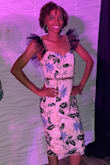 I wore this masterpiece to a reception and felt flawless, honey!!

The dress gave my boyish figure a little curve. The straps were the statement piece I needed and it had just the right amount of character. It exemplified my personality. I didn't get off the dance floor. And the compliments were flowing. - Querida J.