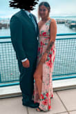 This dress received so many compliments at the summer wedding I attended. It was beautiful ! I am normally a small but so glad I went with the medium because the band under the bust would've been way too tight. I did have to get the dress hemmed because it was too long for my height even with heels. For all my smaller chest ladies, I used Boomba inserts but also got the chest area taken in by the shoulders. While yes I did need to get the dress tailored, if I had gotten a small, I don't believe the zipper would have closed. All in all, I still believe the dress was worth getting. It turned out beautifully. - Gimariel C.