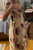 The pic I posted is when I had the small one on and it wouldn't completely zip (so I was holding it) I exchanged it for a medium and I love it soo much. I got the medium within a week of saying I needed an exchange. Before they had even got the small one back. SUPER low cut. Like a lot. Only issue. - Ashley