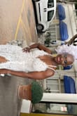 Wore this dress for my destination wedding in Gibraltar (Europe) and it's was everything a dress should be. I received so many compliments. The fit was pretty good even though I could've gotten away with a size 2. It's was super comfortable and I loved the length. I felt super sexy and beautiful in this dress on my very special day. - Carla C.