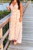 I ordered an extra large and I'm short but was perfect length with wedges so I didn't have to get it hemmed. I wore it for a wedding in Charleston in August so perfect for the occasion and the heat since it was flowy. Just the bust section was weird - it pulled back where the seam is so I had someone sew where the front crosses but also my chest is a heck of a lot smaller than my hips/waist. I am a 38B for reference! I liked that the back laced up / straps were adjustable so I could pull it in however definitely need someone to help you get in and out of the dress! - Meaghan S.
