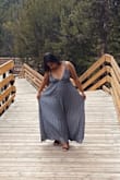 I love this dress & the material is so super light. The pattern is so beautiful and the bust fits so perfect. I'm always skeptical purchasing online but Lulus has never disappointed. I left the shoulder ties as they came and didn't need any adjustment for my height. The perfect length with or without heels. - Gurpreet B.