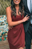I was a bit skeptical, but I really loved it! The fabric is good and the dress is really pretty! I ordered a Small but I believe I could have ordered an XS too, I was a bit afraid that the XS would be too short. Small was perfect length but just a tiny bit loose (very tiny, nothing major that I didn't think it was good). I would definitely recommend! I loved the color as well. - Gaby H.