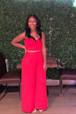 This was my first Lulus purchase (a friend recommended the store to me) as I was looking for an outfit to celebrate my birthday. I love this statement piece! It is classy and bold and the color looked great against my skin tone. I had to get the pants hemmed because they were way too long, but it was totally worth it. As others have mentioned, when you sit down the slit comes up pretty high, so for that reason I probably wouldn't recommend it for a weddings. Nonetheless, it is a beautiful outfit. I got tons of compliments and felt super confident. - Jenny O.