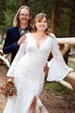 I bought this dress for our wedding photo shoot, after we eloped last year. It fits beautifully, hugging in all the right places. The sleeves and slit make this dress interesting, and it photographs super well. I looked at this dress a lot before I bought it. If you're debating whether or not to get it, go for it! - Taylor W.