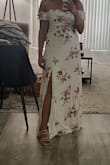 The dress is so pretty! I usually get dresses like this hemmed but not this one. It fits great for shorter people and fits like a floor length dress for my height. There's also a lining inside so it's not see through. - Karol C.