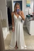 Bought this as a reception dress for my wedding and it's so cute! Fits well and feels more expensive than it is - Jessica S.