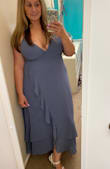 I wore this to a friend's wedding and got so many compliments.  With heals it was the perfect length.  When I switched to flats it was a tiny bit long in the back but not bad.  The straps are adjustable. I wasn't able to wear a bra due to low back and It was ok.   Never felt like I was going to slip out, even while dancing.  Material is good quality, not too thin. - Jessica L.