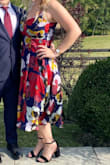 What a beautiful and great quality dress! I could've gone down a size but instead I got the side seams sewn in since there's a lot more fabric in the top part of the dress than I expected. The straps are adjustable which also helped. - Natalie V.
