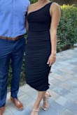 I love this dress! I got so many compliments on it and already had a friend ask to borrow it. It is very flattering/ forgiving in the stomach region as well. Highly recommend! - Arielle F.
