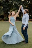 I got this dress for my engagement photos, and at first I ordered a large and it was a bit loose. I returned it and ordered a medium and it was perfect. It photographs super well!! If you want that perfect "spin" dress, this is it!! - Maggie W.