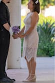 Light weight and delicate material, which makes it good for summer events. I wore this for my bridal photos and have no complaints. Would recommend for the easygoing-wedding-feel or any dressy event. - Amy L.