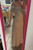 I decided I needed to move my arms freely so I returned it but this dress is gorgeous and very flattering. - Shawna K.