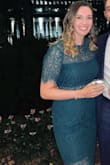 Very flattering dress! Color was beautiful, perfect for fall/winter wedding season! - Kaitlyn O.