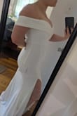 Ok, the Bust selection is a dropdown menu and they don't have my size. I am an extremely awkward 28HH in the bust, meaning that dresses usually just don't fit me. But this one is GORGEOUS and I am so obsessed with it. I had a picture in my head of what I hoped my rehearsal dinner dress looked like and this is 1000% it. 

Fit notes: 
- Bust is tight on me (duh, for a 28HH) but works well once zipped in. I'm wearing a strapless bra.
- Lower part is snug and stretchy, not at all uncomfortable
- Skirt is a bit flowy and moves beautifully. A little long on me with short heels, but I won't be tripping over it, so I'm not getting it hemmed.
- Dress has two layers, and is not at all see-through. I have black shapewear on in the pictures, and you can't tell at all. 
- I found that it also could work strapless for me and appear perfectly natural. If the arms get too restrictive during the evening (I have broad shoulders and semi-muscular arms), I'll probably just pop them down and go for strapless. - Erica S.