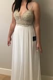 I have been eyeing this dress for a while. I figured for the price what do I have to lose? Worst case it's a dress that will travel easy to my east coast second reception. Best case I end up with a dress for less than $300CAD after taxes and duties.  It's beautiful and I would say better than similar David's Bridal Dress for $1100 CAD!  Order size down like all reviewers are saying. I would say I'm a size 6-8 usually and a have a big butt but the 4 fits (little tight around the chest but I'm up about 10lbs right now and i can still zip up) - Deanne C.