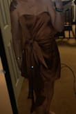 This dress is so beautiful, the color is perfect & just like the picture, the material is great, it has the sticky banding on top of the inside chest so it doesn't fall down. Great material too! I usually order an XSmall for everything but this wouldn't come close to zipping & they're sold out of the other sizes. :( - Tory R.