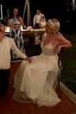 This was the perfect reception dress for my summer wedding after I took off my 10lb lace mermaid monstrosity; it was light, airy and fun. A little casual for church due to the (tastefully) sheer bodice, but perfect for a dance party. I was surprised to see very tiny Pearl appliqués on the lace in person (I hate embellishments, typically) but the subtle detail actually added a nice texture. Definitely no vanity sizing here, order up to your typical formalwear size! I am normally a size 6, and initially ordered an 8 after a review calling out that the fabric has no stretch. Alas, it was just shy of zipping, but the 10 was perfect. Lots of complements, the skirt draped and moved nicely, and I was super comfortable. Just bummed that I will probably never get to wear it a again, would a casual summer barbecue be appropriate? - Kyleen