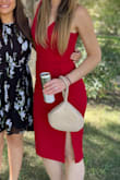 Wore this to a wedding in CA in the height of summer. Loved the fit, hugs in all the right places and the slit (though a little high) is perfectly playful. The slip underneath may not do much for you if you have a booty though, just be aware. If you're even borderline thicc it might barely cover back there. Also, was hot as ever and the dress did not show my sweat! Would highly recommend but size appropriately if you've got any junk in the trunk. - Mary L.