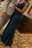 I absolutely LOVED wearing this dress! The material of the dress is very thick yet stretches for dancing. I would recommend sizing down. - Britney P.