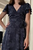 This dress is gorgeous. I wore it to a wedding. It was perfect! I would only say it felt a little loose at my bust, but not too bad. Overall I would definitely recommend this dress! - Shiloh K.