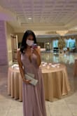 Wore this to a formal summer wedding and received so many compliments! I used body tape to keep things in place (if you know what I mean). I will say it's a bit long even with heels on so I had someone hem the dress about 2 inches. - Grecia V.