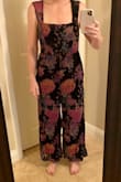 Wow, what a disappointment. The material is as gorgeous as I hoped, and that's the only thing about this jumpsuit that didn't let me down. It was easily 4 inches too short in the length, showing my ankles, the waist was entirely square without shape, yet the material has little to no give so it flattened my chest. I had such high hopes for this and feel if at least the length had been appropriate I would have taken it in to get it altered, but with the chest being tight, the length so far off and the waist there was no saving it for me. I also felt the legs could be wider, and didn't like the pattern being slightly matched but just off from leg to leg. If the pattern had been mirrored or more random that would have worked.
This would definitely work for someone 5'4", with a square body type and smaller chest. On the right person I would imagine it'd be gorgeous, however not for an average height, hourglass shape. The photos aren't the right angle to show the length, sorry! Don't recommend for the price. - Tonya H.