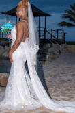 This dress fit perfectly. It has just a touch of stretch. It has built-in bra cups. The straps have strong loop holes to hold the girls up. And to my surprise it has a slight shimmering effect. I felt fabulous - Jewel R.