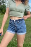 Love this shirt! It's cropped but not too short and the green color is so pretty in person. Great material and not too thick so great for summer - Molly P.